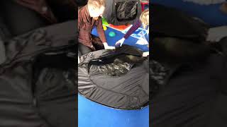 Folding down a Sensory Direct pop up dark play tent [upl. by Eissel]